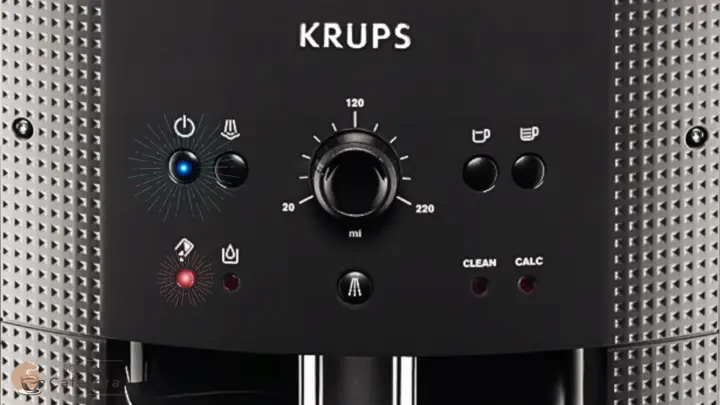 The on - off button light is illuminated with a double flashing, and the coffee grounds drawer emptying light has a single flashing